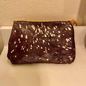 Cowhide wristlet/makeup bag